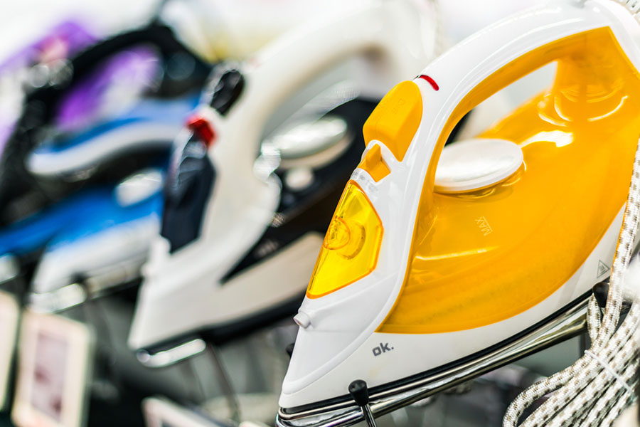 Critères essentiels pour sélectionner votre fer à repasser rayon de magasin avec plusieurs fers à repasser